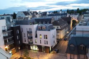 an aerial view of a city with buildings at Suite Place de l'Etoile in Strasbourg