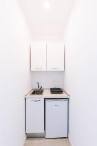 O bucătărie sau chicinetă la Casa Don Matteo