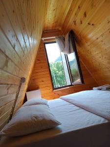 Postel nebo postele na pokoji v ubytování Cottage Natali