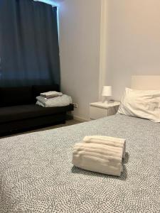 Ένα ή περισσότερα κρεβάτια σε δωμάτιο στο Moreira Terrace