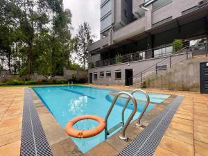 Kolam renang di atau dekat dengan Executive 3-Bed Apartment in Kitusuru Nairobi