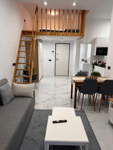 a living room with a couch and a table at Mark Suite B8 in Fuengirola