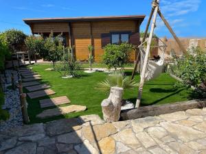 Κήπος έξω από το Casa em madeira com jardim privado