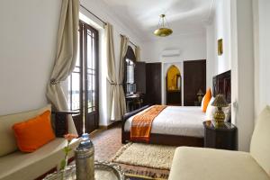 Uma cama ou camas num quarto em Riad Zoraida