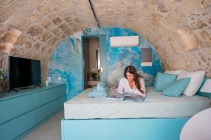 Una cama o camas en una habitación de Kritiki Spilia - Home & Spa 17 fotos más