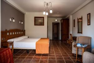 Posteľ alebo postele v izbe v ubytovaní Hotel La Fragua II