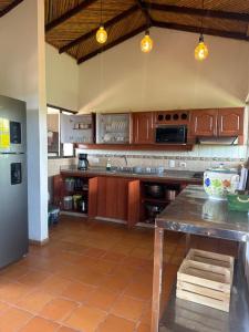 Kuchyň nebo kuchyňský kout v ubytování finca turística DanuBio Alojamiento Rural Pereira Risaralda