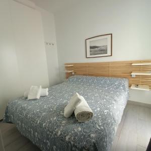 Postel nebo postele na pokoji v ubytování La Casa de los Viajantes