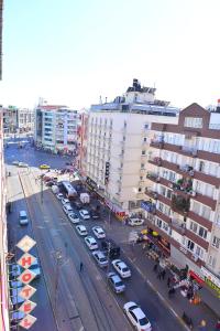 an overhead view of a city street with cars parked at Kivrak Hotel in Antalya