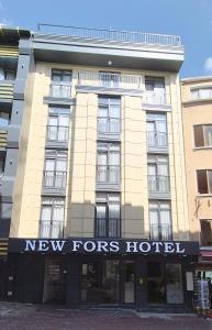 a building with a new fors hotel sign on it at New Fors Hotel in Istanbul
