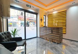 a lobby with a reception desk in a store at New Fors Hotel in Istanbul