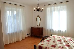 מיטה או מיטות בחדר ב-Tana Degli Orsi