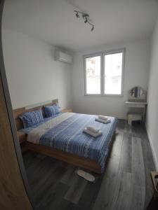 Postel nebo postele na pokoji v ubytování Apartment Kiril