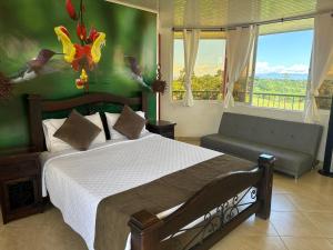 Postel nebo postele na pokoji v ubytování finca turística DanuBio Alojamiento Rural Pereira Risaralda