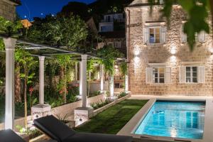 Swimmingpoolen hos eller tæt på HERITAGE VILLA SPINDLER by DuHomes