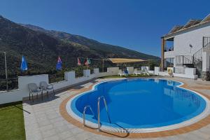 Bazén v ubytovaní Hotel La Fragua II alebo v jeho blízkosti
