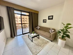 Posezení v ubytování Gaddis Hotel, Suites and Apartments