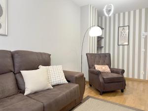 A seating area at Apartamentos 2K - Apartamento junto al casco viejo