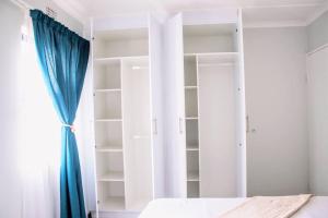 Postel nebo postele na pokoji v ubytování 7 on Laibach - Buhrein Estate, Kraaifontein