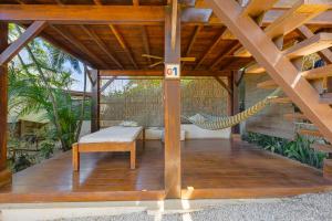 Балкон или терраса в The Beach Bungalows Tamarindo- Adults Only