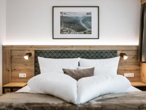 Postel nebo postele na pokoji v ubytování Alpenapartments