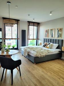 Ένα ή περισσότερα κρεβάτια σε δωμάτιο στο Apartamenty K17 Stare Miasto