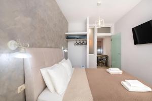 Postel nebo postele na pokoji v ubytování Labyrinth Hotel