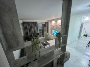 Televisyen dan/atau pusat hiburan di Disy Apartments