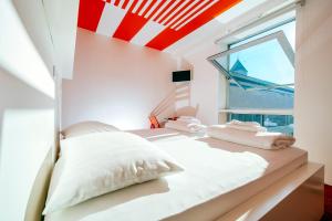 Postel nebo postele na pokoji v ubytování Boutique Hostel Forum