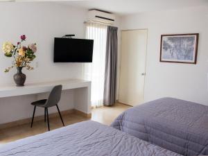 TV a/nebo společenská místnost v ubytování Hotel St. George