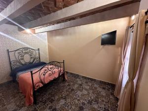 เตียงในห้องที่ Casa Piedra Parada