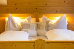 Postel nebo postele na pokoji v ubytování Hotel Urthaler