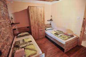 Postel nebo postele na pokoji v ubytování Casa Storia & Casa Antica