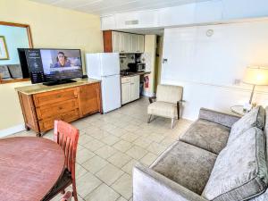Kuchyň nebo kuchyňský kout v ubytování Quebec Motel