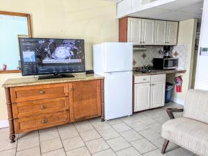 Kuchyň nebo kuchyňský kout v ubytování Quebec Motel
