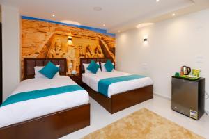 En eller flere senger på et rom på Diamond Pyramids View Inn + 76 bilder