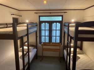 Postel nebo postele na pokoji v ubytování Sky Hostel Negombo + 37 fotografií
