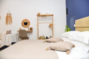 Postel nebo postele na pokoji v ubytování OASIS RESIDENCE