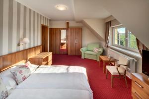 Krevet ili kreveti u jedinici u okviru objekta Hotel Kolonie