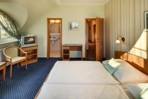 Krevet ili kreveti u jedinici u okviru objekta Hotel Kolonie