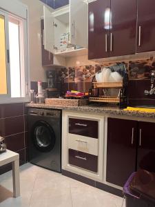 Köök või kööginurk majutusasutuses Appartement confortable neuf