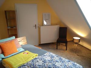 Postel nebo postele na pokoji v ubytování Ferienwohnung am Küstenwald