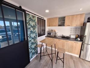 Kuchyň nebo kuchyňský kout v ubytování Joli studio 25m2 avec cuisine