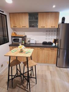 Kuchyň nebo kuchyňský kout v ubytování Joli studio 25m2 avec cuisine