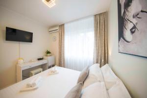 Postel nebo postele na pokoji v ubytování A-more accommodation