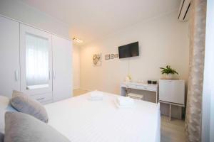 TV a/nebo společenská místnost v ubytování A-more accommodation