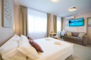 Postel nebo postele na pokoji v ubytování A-more accommodation