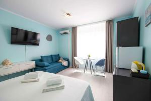TV a/nebo společenská místnost v ubytování A-more accommodation