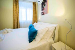 Postel nebo postele na pokoji v ubytování A-more accommodation