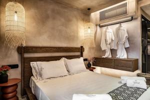 Ένα ή περισσότερα κρεβάτια σε δωμάτιο στο Paragon Suites 2 +27 φωτογραφίες